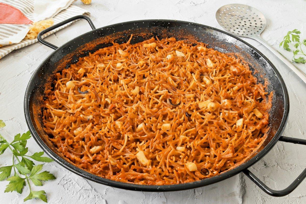 fideua dish served in paella pan fideua dish served in paella pan